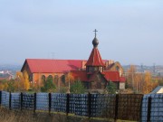 Церковь Царственных Страстотерпцев в усадьбе Мелихова (деревянная)